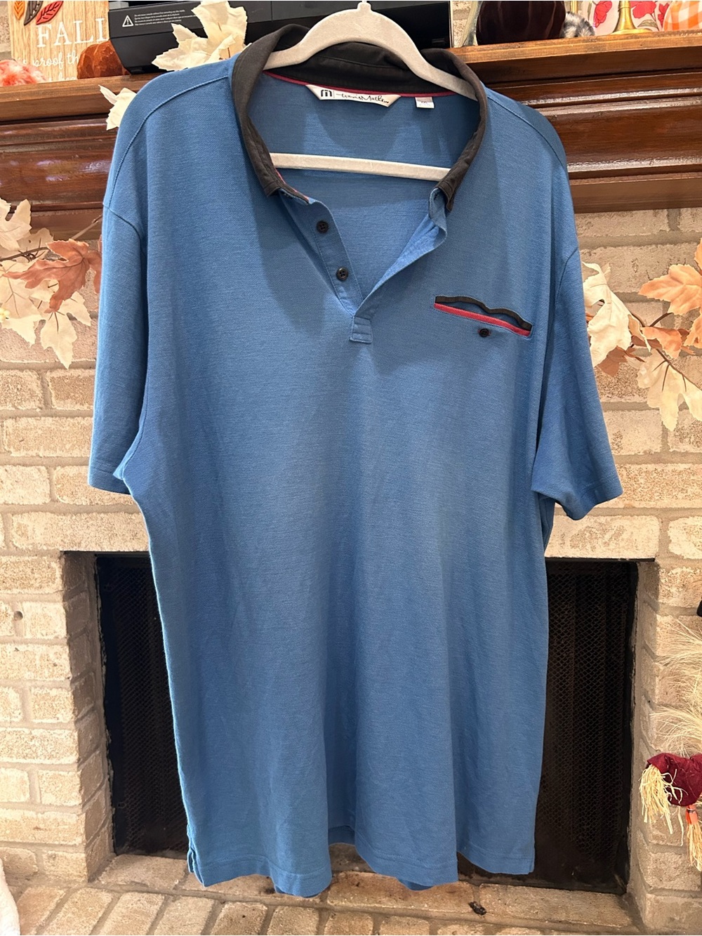 Travis Mathew Blue Polo with Black Collar and Red Trim EUC